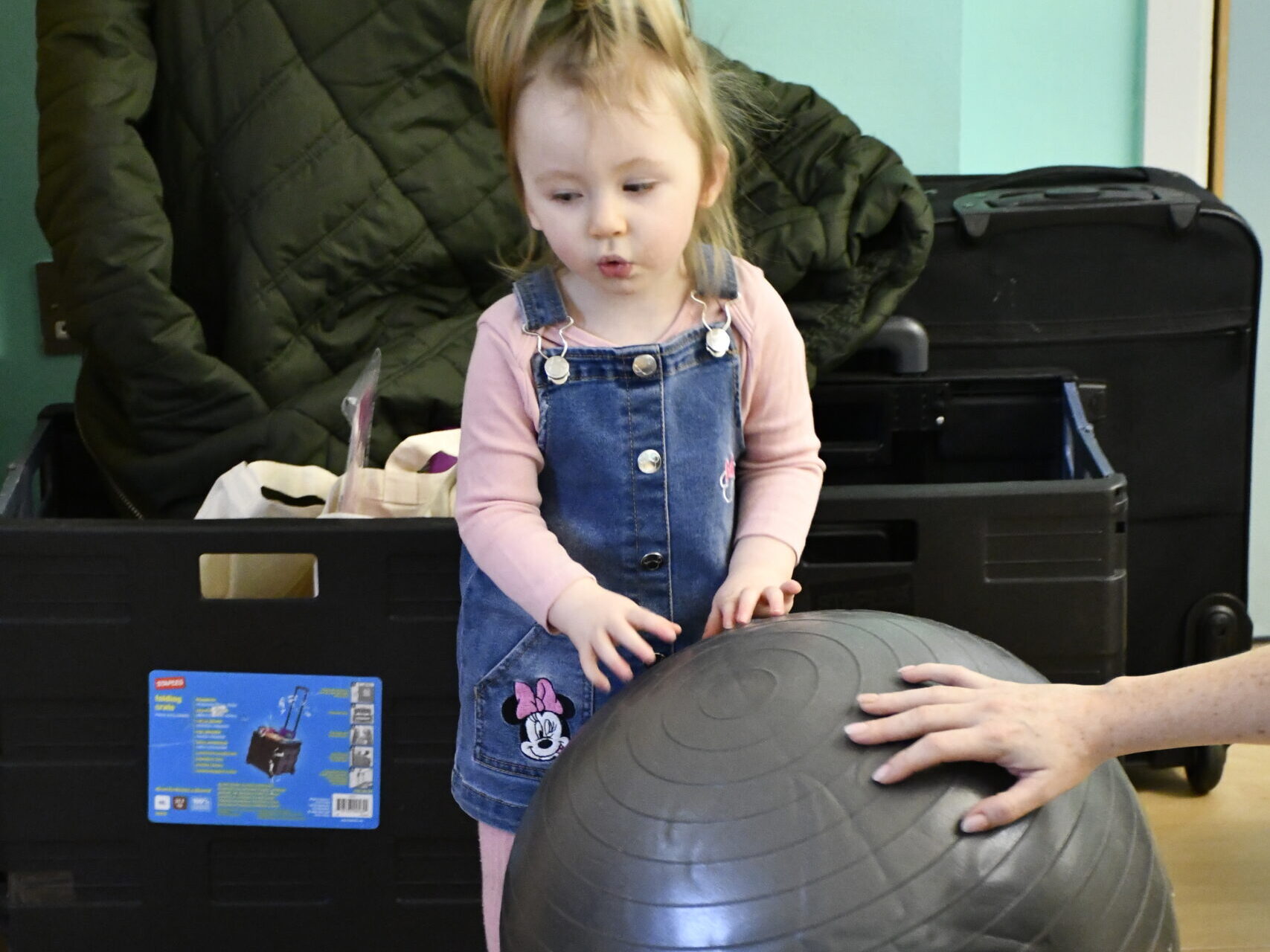 7 Easy Sensory Activities Using a Therapy Ball - Your Kid's Table