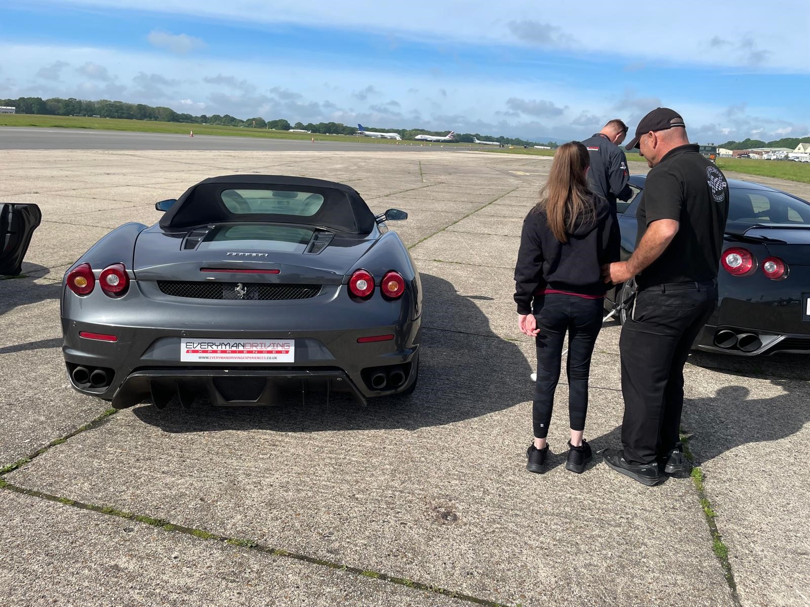 Charlotte being guided to the car